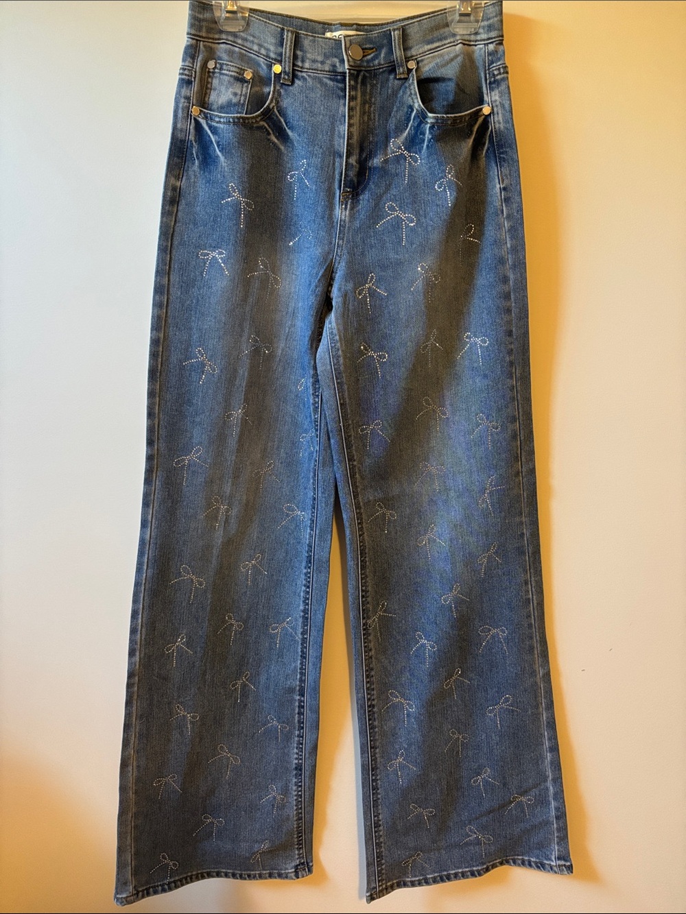 Oat New York Dark Blue Wide-Leg Jeans with Subtle Bow Embellishments